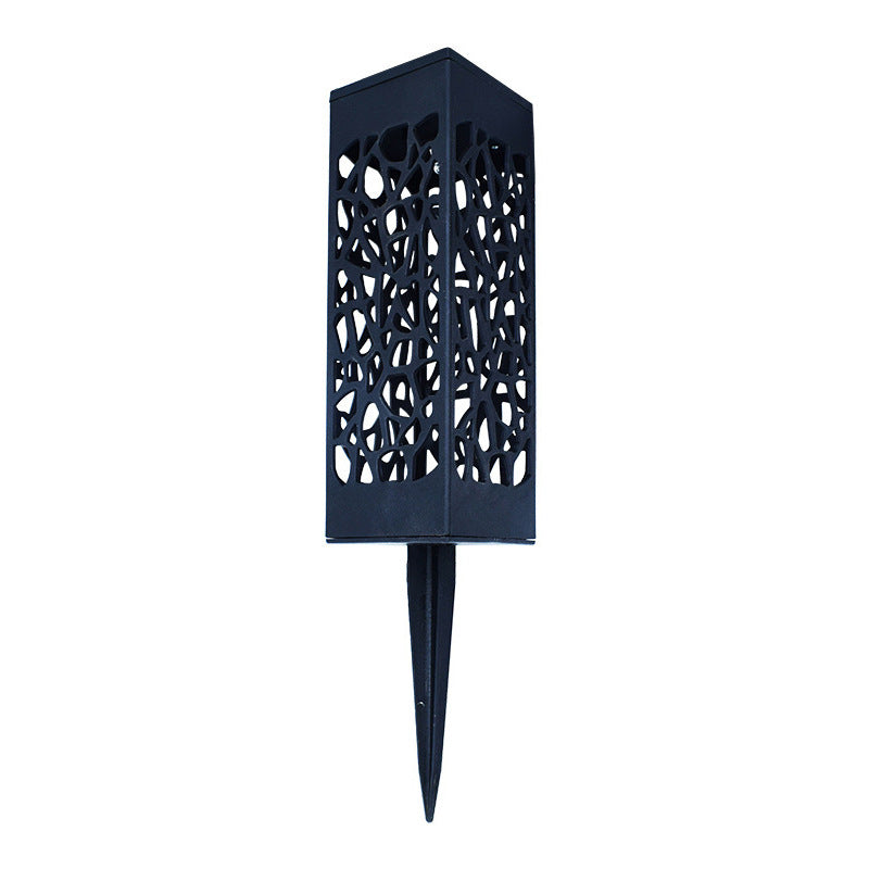 Solar filigree pathway light on a white background